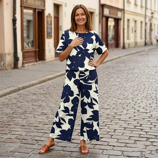 🌸 Dámský letní set – tričko s krátkým rukávem + široké kalhoty, moderní květinový motiv 🌿 Pohodlné, stylové a ideální na léto! ✨