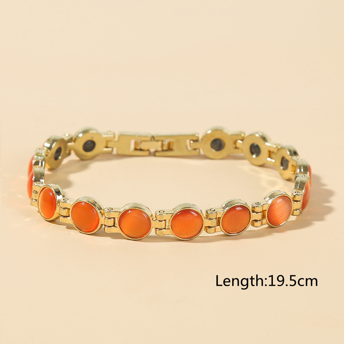 Elegancka bransoletka magnetyczna ze złotym kamieniem Cat Eye