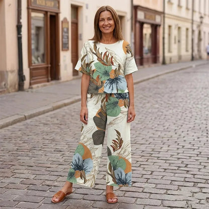 🌸 Dámský letní set – tričko s krátkým rukávem + široké kalhoty, moderní květinový motiv 🌿 Pohodlné, stylové a ideální na léto! ✨