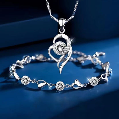✨✨【Vásárolj egyet, kapsz egyet ingyen】💎💎925 ezüst karkötő és nyaklánc szett óceáni szív motívummal