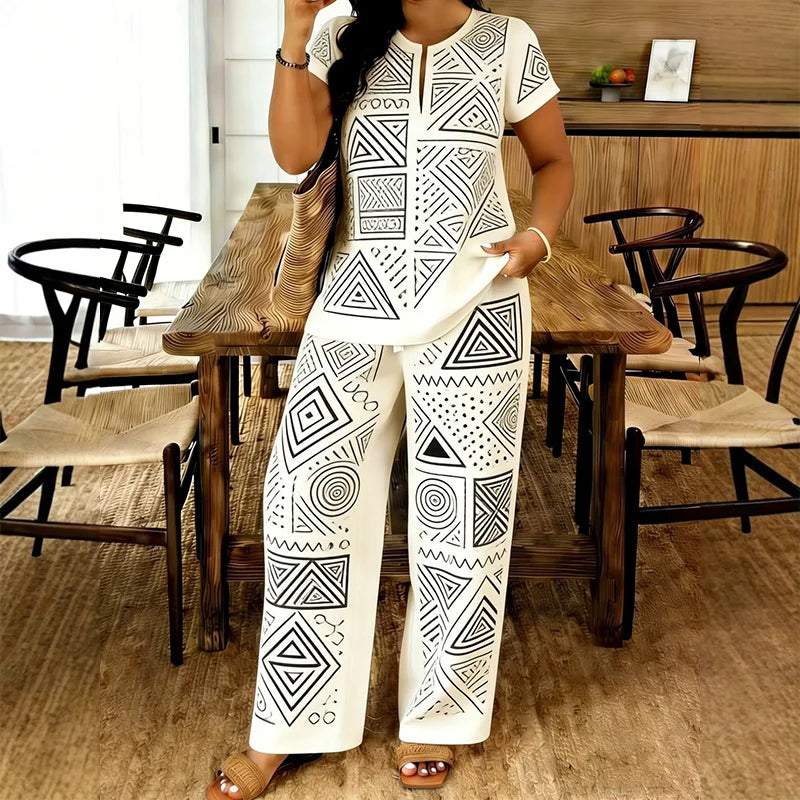 🥼 Compleu de Vară Premium: Bluză cu Decolteu în V și Pantaloni Lejeri – Material Fluid, Efect de Alungire, 6 Culori, S-2XL! ✨☀️