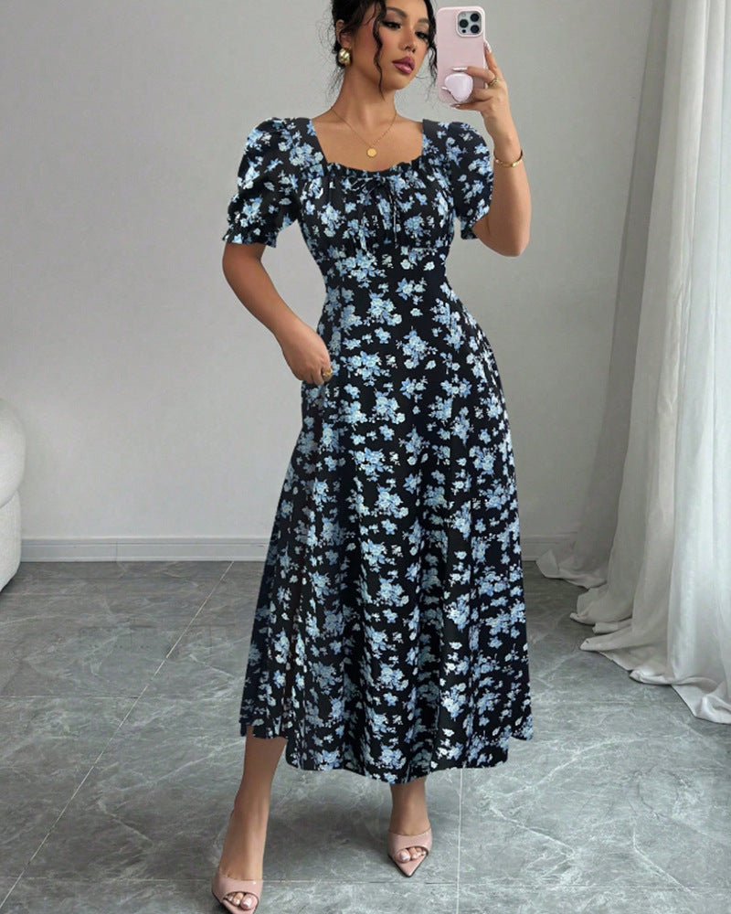 👗Poslední den akce -50%! 【S-2XL】Elegantní letní šaty s květinovým potiskem, vzdušné a pohodlné, snadno se stylizují, zeštíhlují postavu.