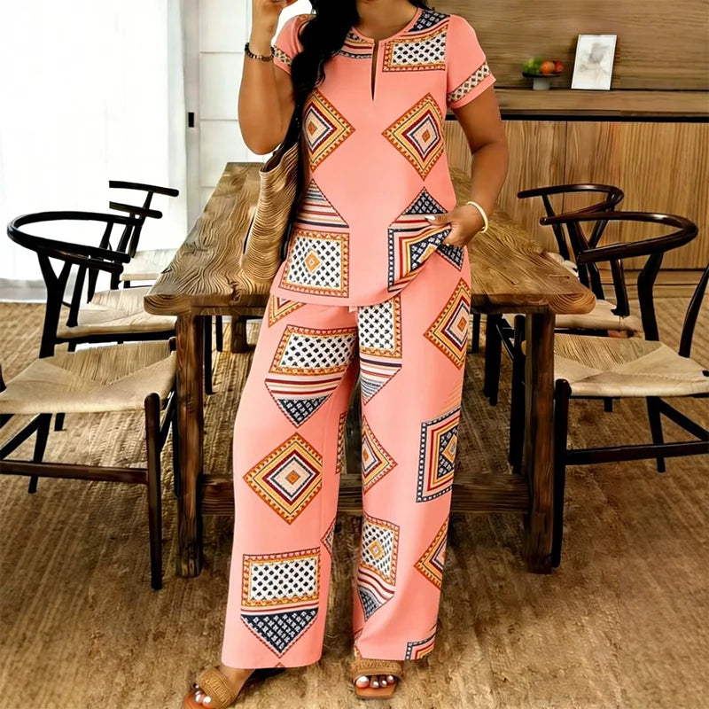 🥼 Compleu de Vară Premium: Bluză cu Decolteu în V și Pantaloni Lejeri – Material Fluid, Efect de Alungire, 6 Culori, S-2XL! ✨☀️