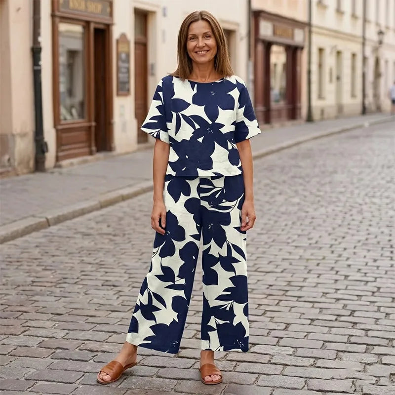 🌸 Dámský letní set – tričko s krátkým rukávem + široké kalhoty, moderní květinový motiv 🌿 Pohodlné, stylové a ideální na léto! ✨